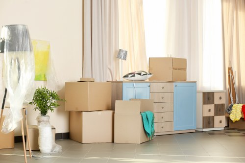 Man With Van Woodford team using safe moving equipment during a property move