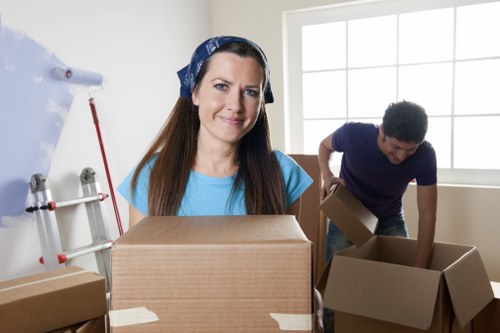 Professional movers handling a local house move in Woodford