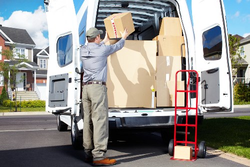 Furniture being carried from a residential property during a Woodford move