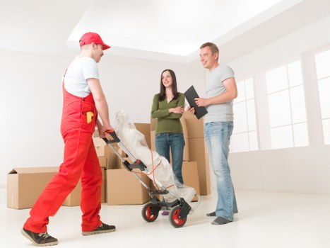 Packed household boxes prepared for removals in Woodford